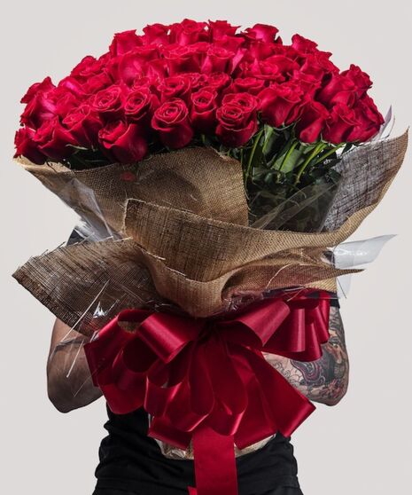 100 Wrapped Roses