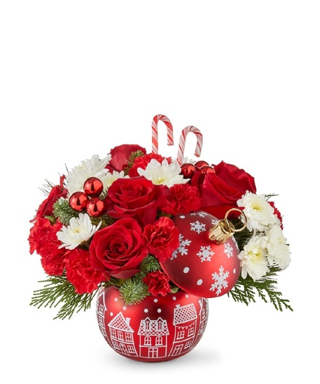 christmas floral arrangement with cheerful ornament container