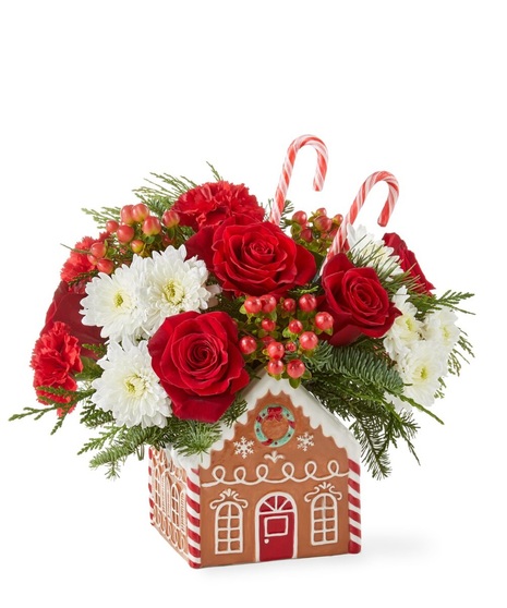christmas floral arrangement with cheerful ornament container