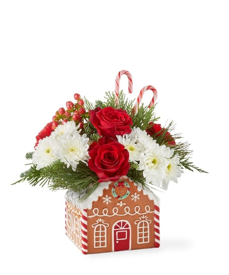 christmas floral arrangement with cheerful ornament container