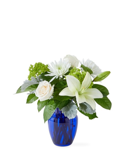 snowy dream white flowers in blue vase